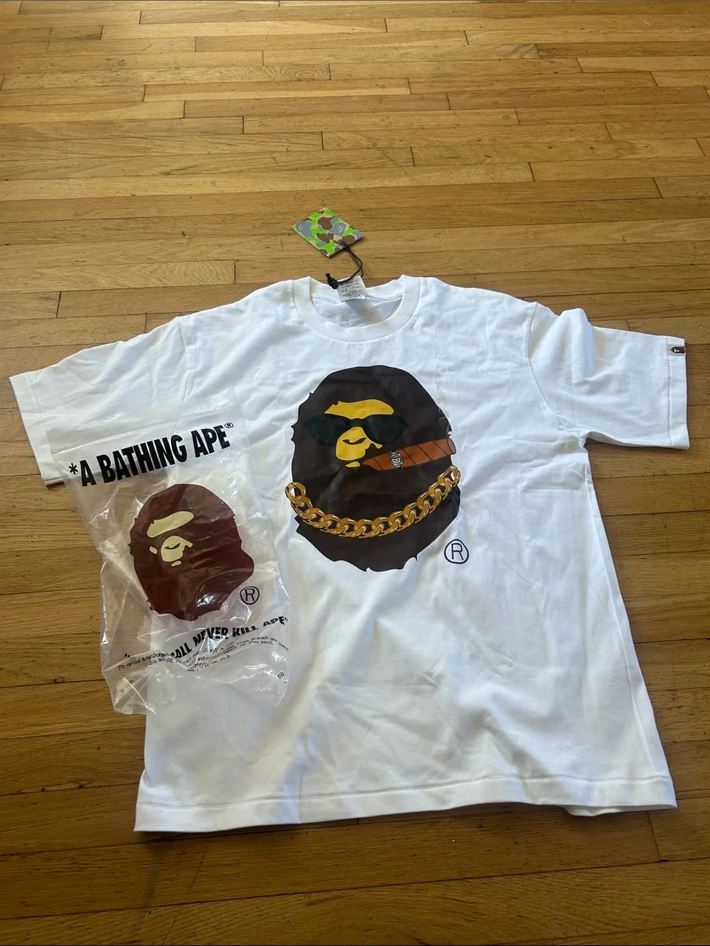 A Bathing Ape Kids White Graphic Ape Tee with Gold Chain Print